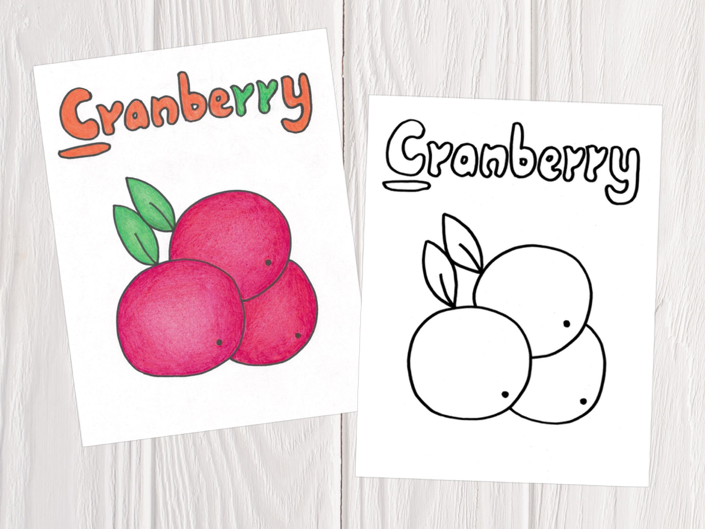 ArtBeesy printable coloring book with a sample coloring page of a cranberry.